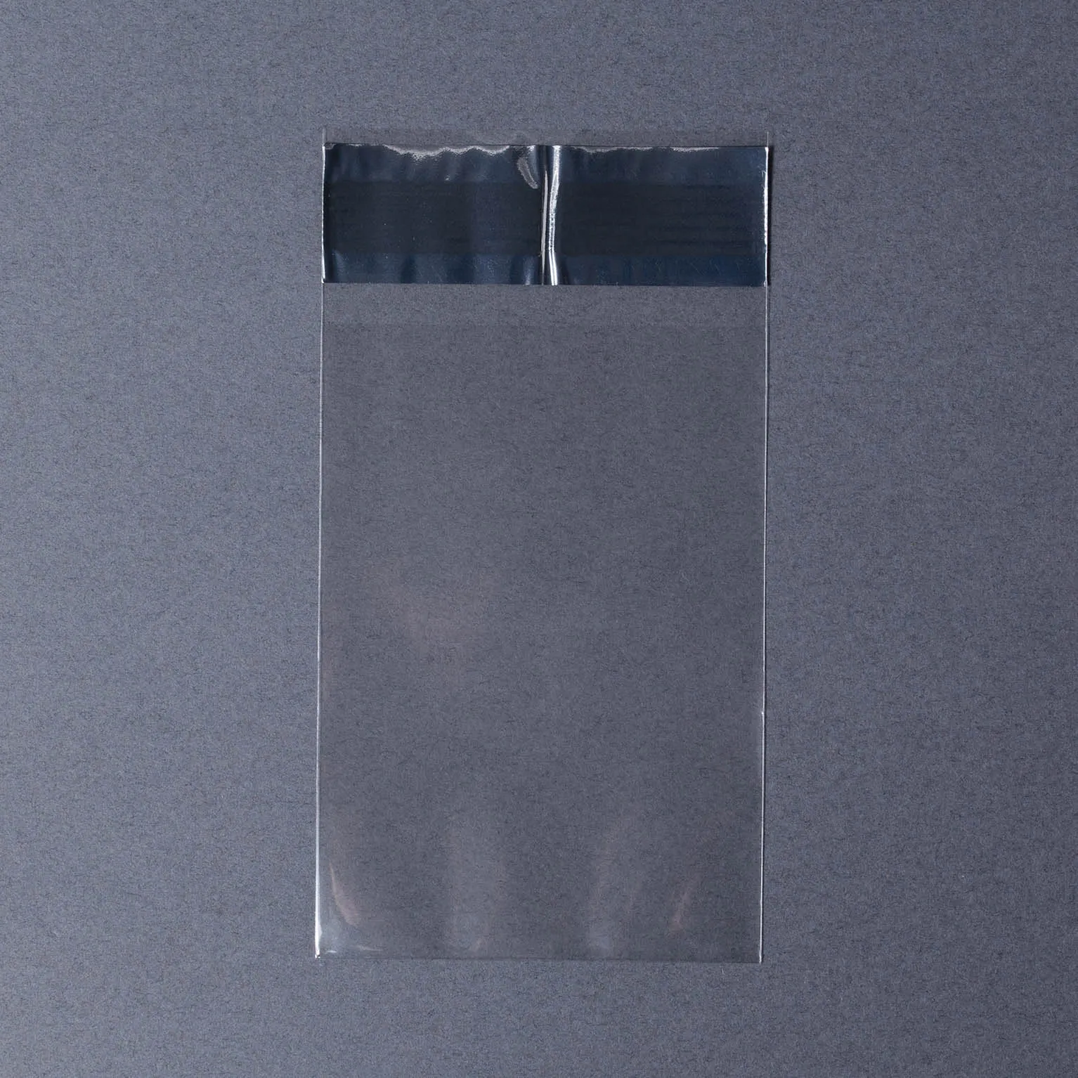 D-9 透明無地パック テープ付 (70×100+30) 1000